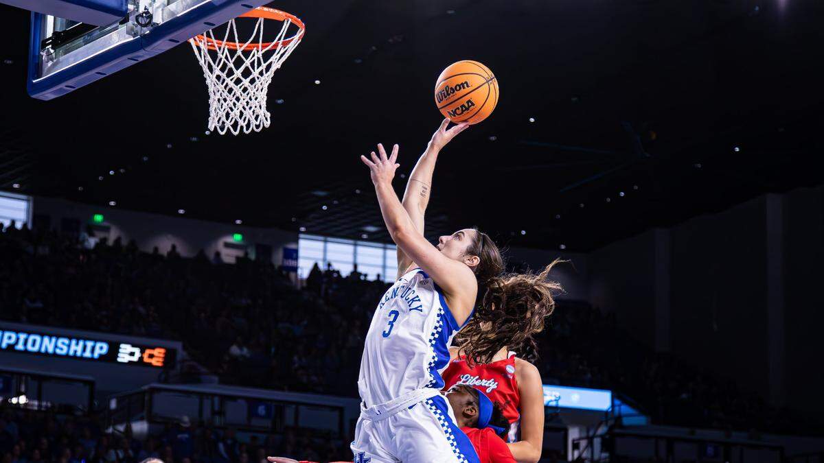 Georgia Amoore tied Kentucky’s NCAA Tournament single-game record by scoring 34 points to lead the Wildcats past Liberty on Friday.