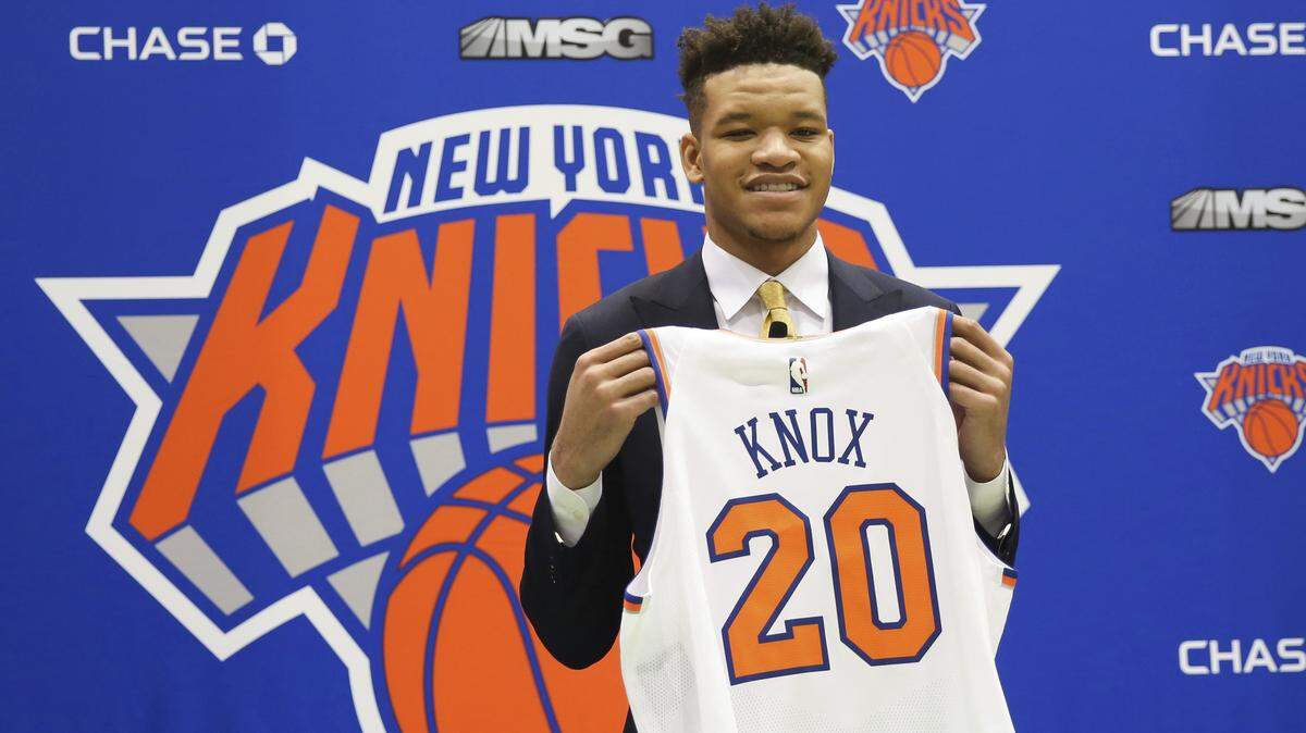 New York Knicks first round NBA Draft pick, Kevin Knox, posed with his jersey at the teams training facility on June 22.