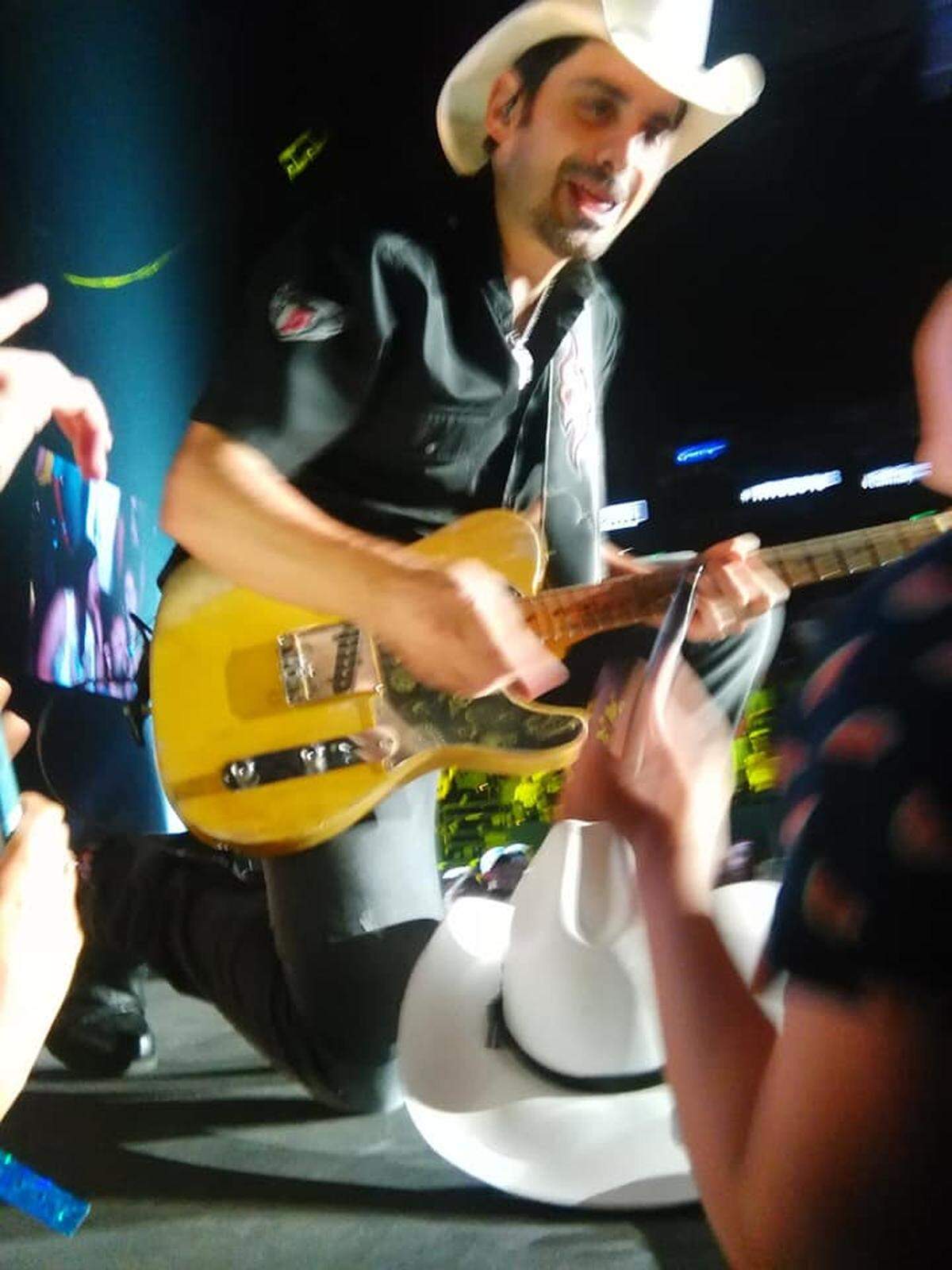 During country singer Brad Paisley’s performance at Red, White and Boom in Lexington Saturday night, he gave an unexpected surprise to one young fan. He gave 9-year-old Brooklynn Goodin, pictured, his signed guitar that he played during the set.