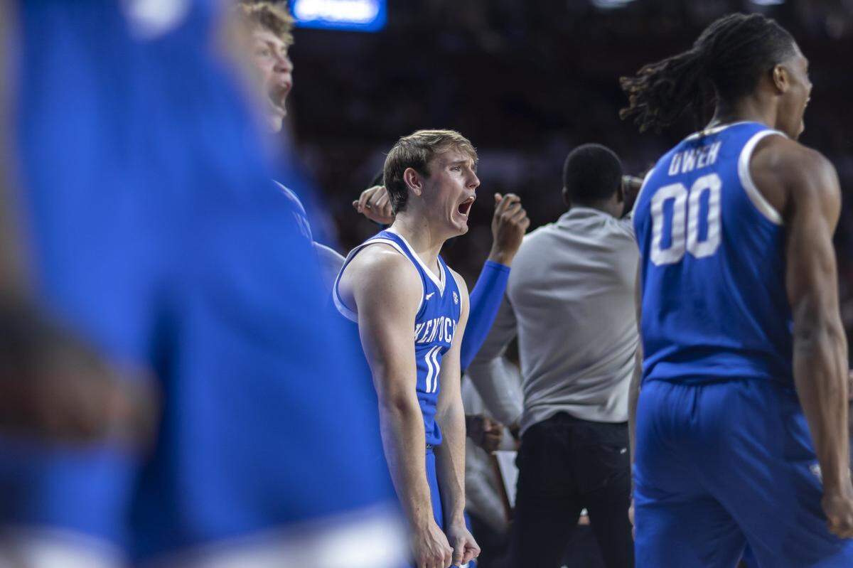 Kentucky guard Travis Perry (11) reacts during a game against Oklahoma in Norman on Feb. 26.