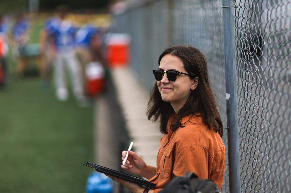 Herald-Leader reporter Caroline Makauskas photographed during the game at Lexington Catholic High School in Lexington, Ky, Friday, September 1, 2023.
