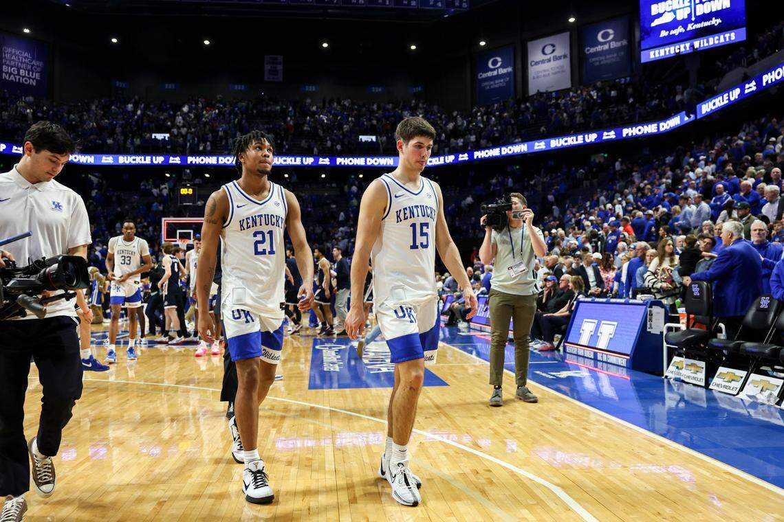 Kentucky’s D.J. Wagner (21) and Reed Sheppard (15) leave the court after Saturday’s loss to Gonzaga at Rupp Arena.