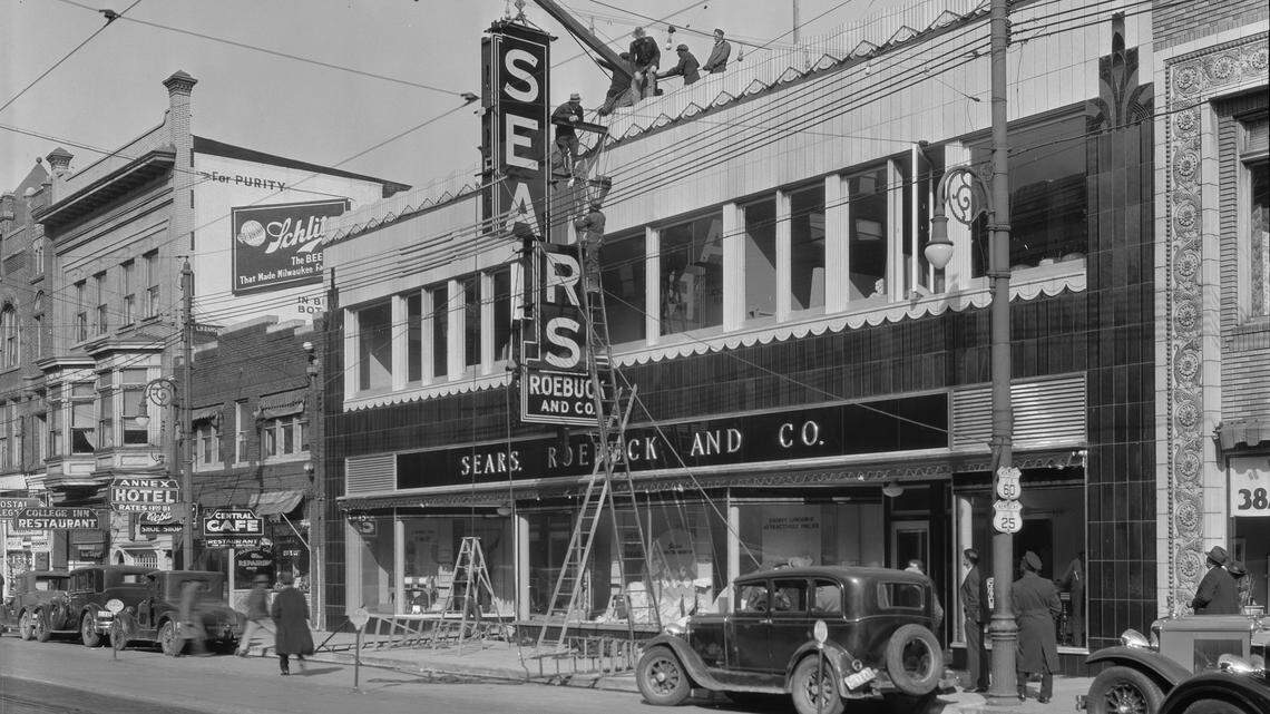 Above: In November 1934, Brock Electrical Company hung a sign at the new location of Sears Roebuck and Company, 213 East Main Street in Lexington. Sears had moved its merchandise from the old location on the south side of East Main into this new building.
Left: The current mall entrance to Sears at Fayette Mall in Lexington. Sears is closing the store, and the mall plans to redevelop the space.