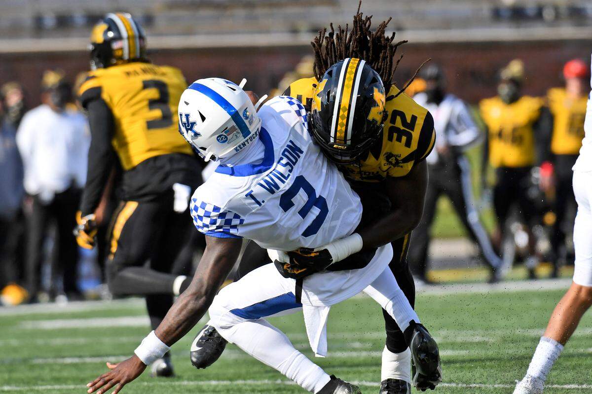 Kentucky quarterback Terry Wilson (3) was hit by Missouri linebacker Nick Bolton (32) during the first half of Mizzou’s 20-10 victory over UK on Saturday.