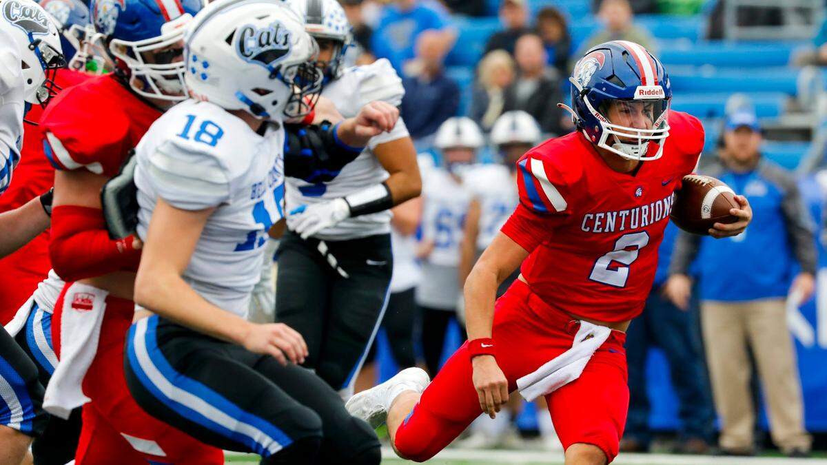 Christian Academy-Louisville’s Cole Hodge (2) runs for a first-half touchdown during the Class 3A state championship game at Kroger Field in Lexington on Saturday. CAL defeated Bell County 41-16 in the first of three state finals on the day.