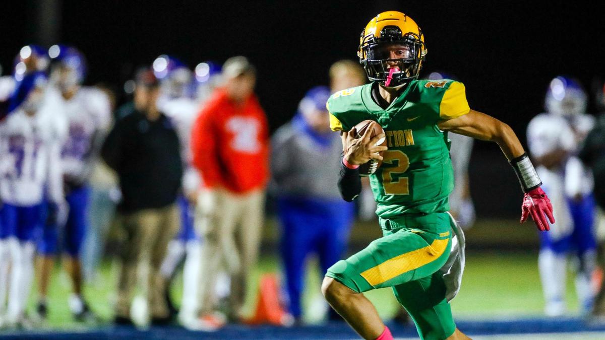 Bryan Station quarterback Trenton Cutwright runs for a touchdown against Madison Central on Oct. 21. He was a first-team All-City selection.