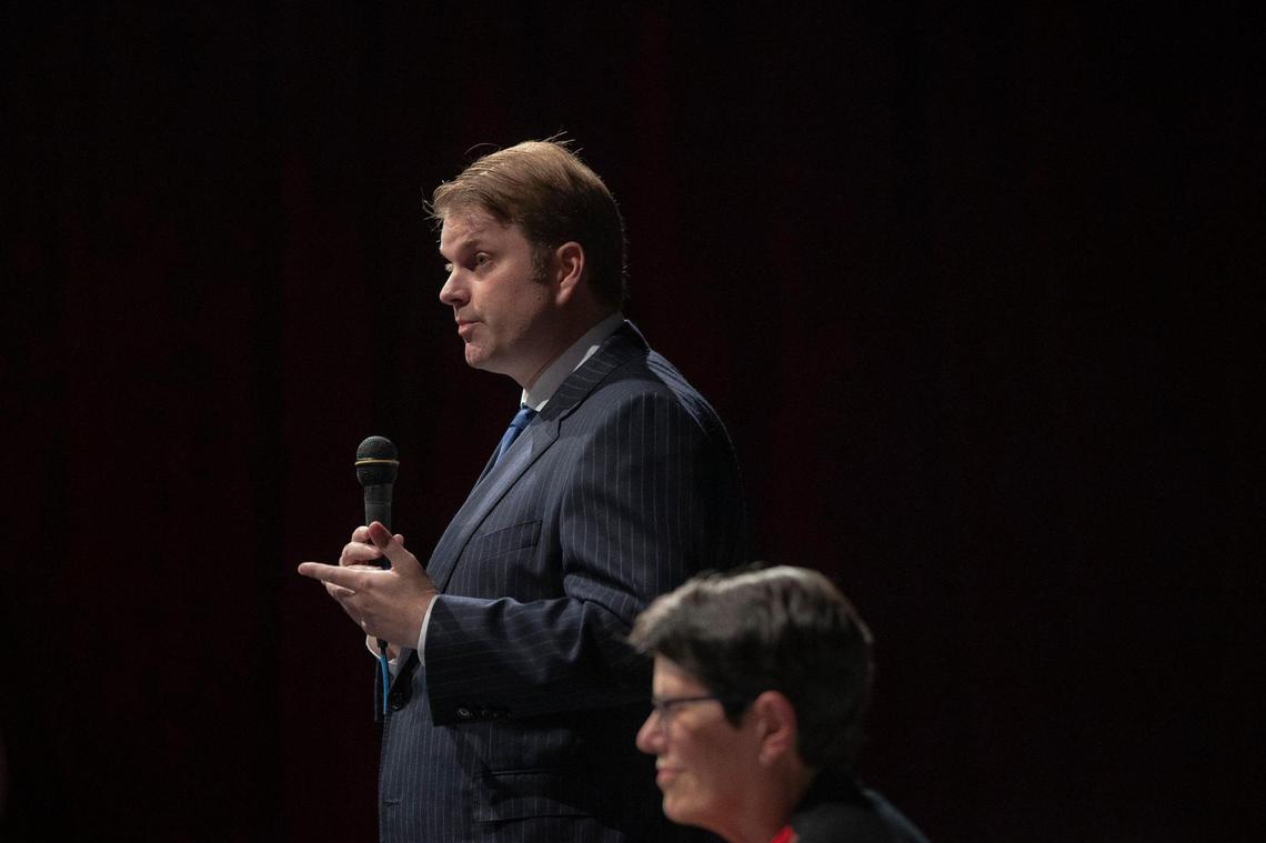 David Kloiber, a candidate for Lexington mayor, speaks while current Mayor Linda Gorton looks on during a candidate forum at the Lyric Theatre and Cultural Arts Center in Lexington, Ky., on Wednesday, Sept. 14, 2022.