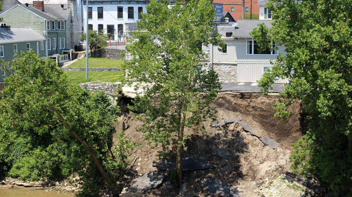 An embankment collapsed along the Kentucky River near downtown Frankfort, Ky., Friday.
