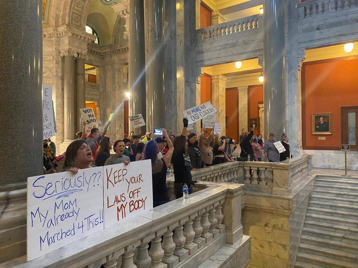 Protesters in the Kentucky Capitol on Nov. 15, 2022, gathered to oppose Attorney General Daniel Cameron’s defense of Kentucky’s abortion bans in a case that came before the Kentucky Supreme Court on Tuesday. While the high court heard oral arguments, protesters chanted, “Bans off our bodies,” and, “abortion is a right, we won’t give up this fight.”