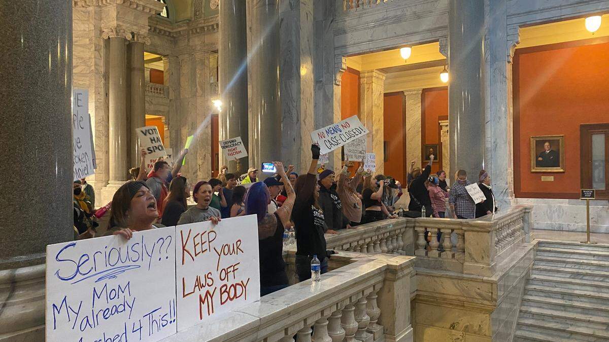 Protesters in the Kentucky Capitol on Nov. 15, 2022, gathered to oppose Attorney General Daniel Cameron’s defense of Kentucky’s abortion bans in a case that came before the Kentucky Supreme Court on Tuesday. While the high court heard oral arguments, protesters chanted, “Bans off our bodies,” and, “abortion is a right, we won’t give up this fight.”