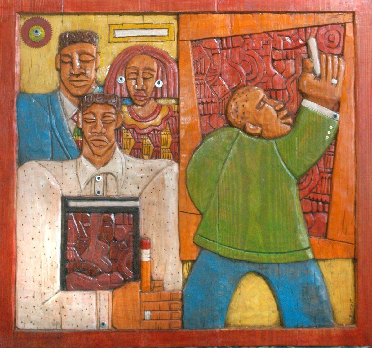 This carved wood piece, titled “Educator,” by LaVon Williams, was commissioned by Eastern Kentucky University in 2007.