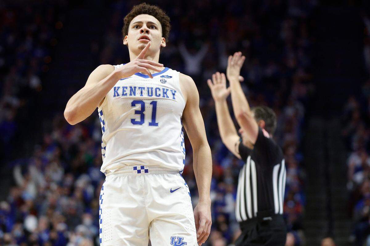 Kentucky Wildcats guard Kellan Grady (31) celebrates a three-point shot during a game against the Western Kentucky Hilltoppers at Rupp Arena in Lexington, Ky., Wednesday, Dec. 22, 2021.