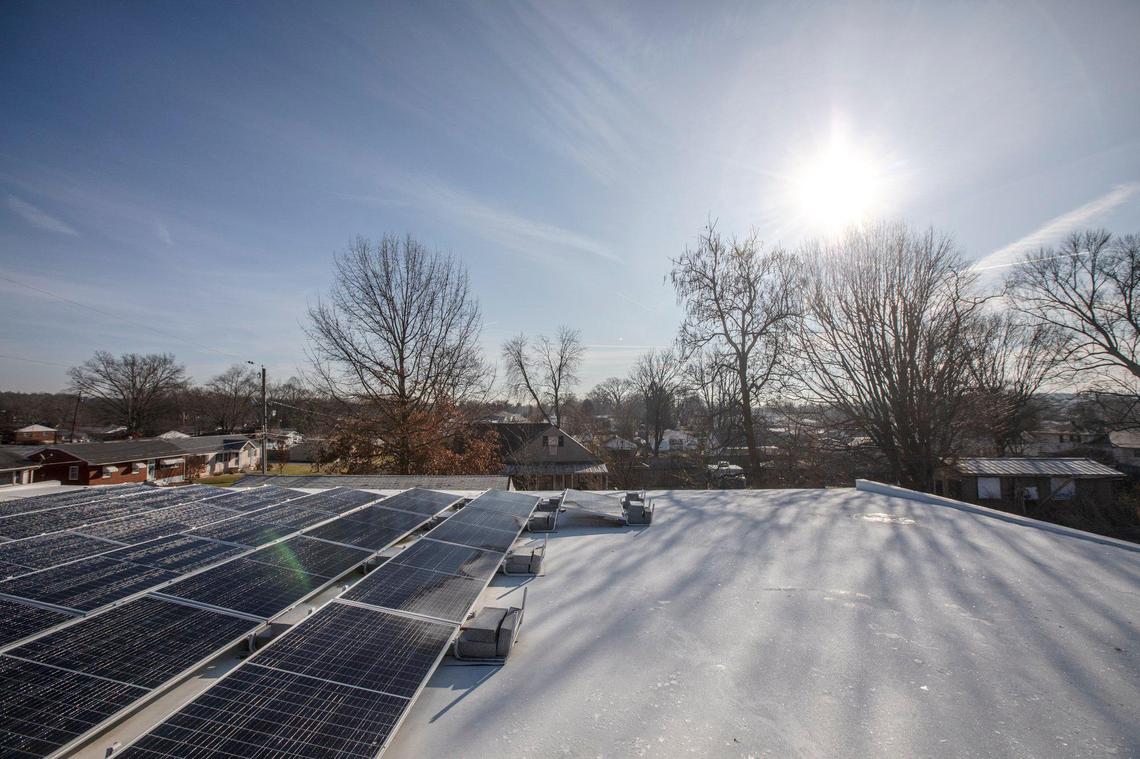 Solar panels line the roof of Print My Threads in Flatwoods, Ky. Friday, Dec. 20, 2019