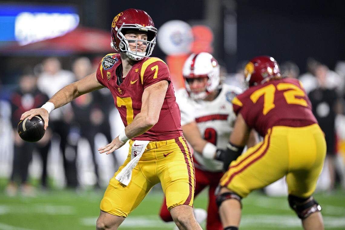 While playing for USC, quarterback Miller Moss (7) threw for six touchdowns against Louisville to lead the Trojans to a 42-28 win in the 2023 Holiday Bowl. In 2025, Moss will be playing for U of L as the Cardinals’ starting QB.
