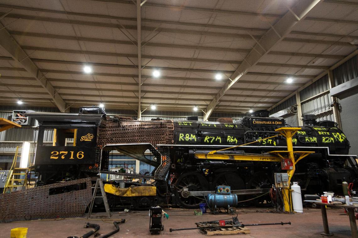 75-year old steam locomotive C&O 2716 sits in the renovated CSX mechanic shop while under restoration in Irvine, Estill County, Ky., Monday, November 2, 2020. Kentucky Steam has already purchased land from CSX and is ready to start construction on the venue, with the sponsorship of Hardy Oil, that it hopes will lead the way for other endeavors to celebrate the regions railroad heritage. In 2018 Kentucky Steam Heritage Corporation purchased the property from CSX Transportation for a future rail-based tourism and historical development.