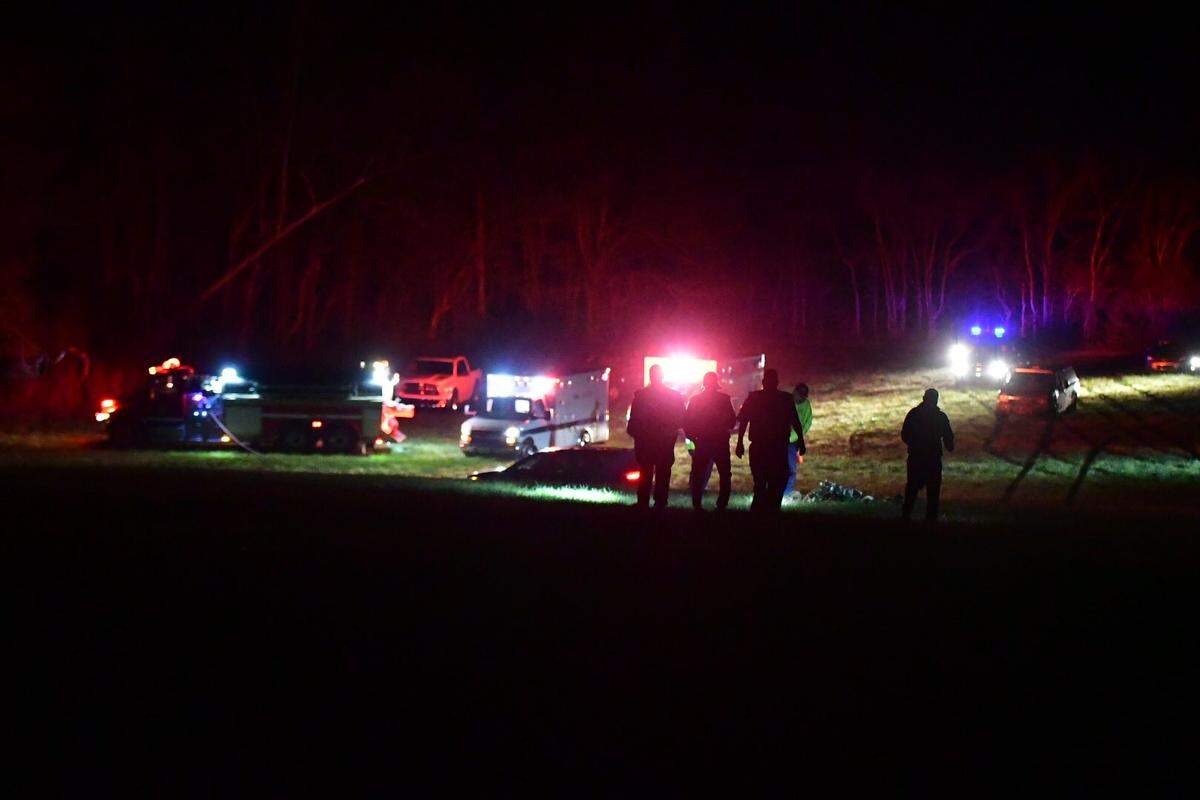 First responders assess the scene of a military helicopter crash in Trigg County on March 29, 2023. Military officials reported there were several casualties due to the incident.