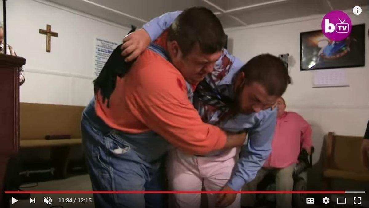 Cody Coots had to be carried away from the church after he was bitten by a snake in a clip shown on “My Life Inside: The Snake Church.”