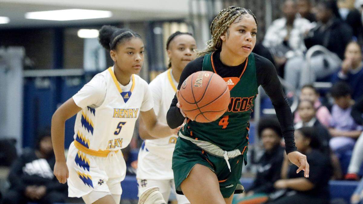 Frederick Douglas’ Niah Rhodes (4) runs on the fast break during a game against Henry Clay on Jan. 5.