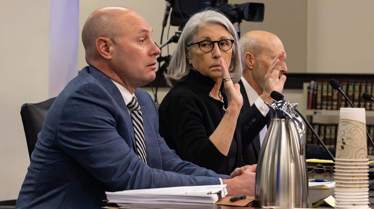 Fayette Circuit Judge Julie Goodman sits with her attorneys Mitchel Denham and Robert McBride during her impeachment hearing held in room 131 at the Capitol Annex Building in Frankfort, Ky, on March 16, 2026.