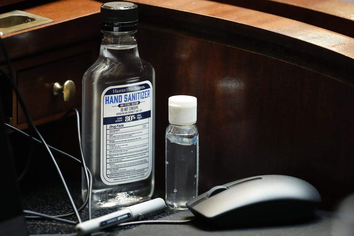 Hand sanitizer sits on the desk of Sen. Robin Webb, D-Grayson, during a Kentucky Senate floor session at the state Capitol In Frankfort, Ky., Wednesday, April 1, 2020.
