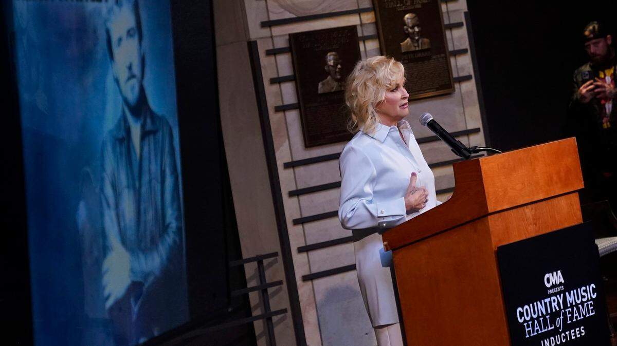 Lorrie Morgan, widow of country singer Keith Whitley, speaks at the Country Music Hall of Fame after it was announced Whitley will be inducted as a member Tuesday, May 17, 2022, in Nashville, Tenn. (AP Photo/Mark Humphrey)