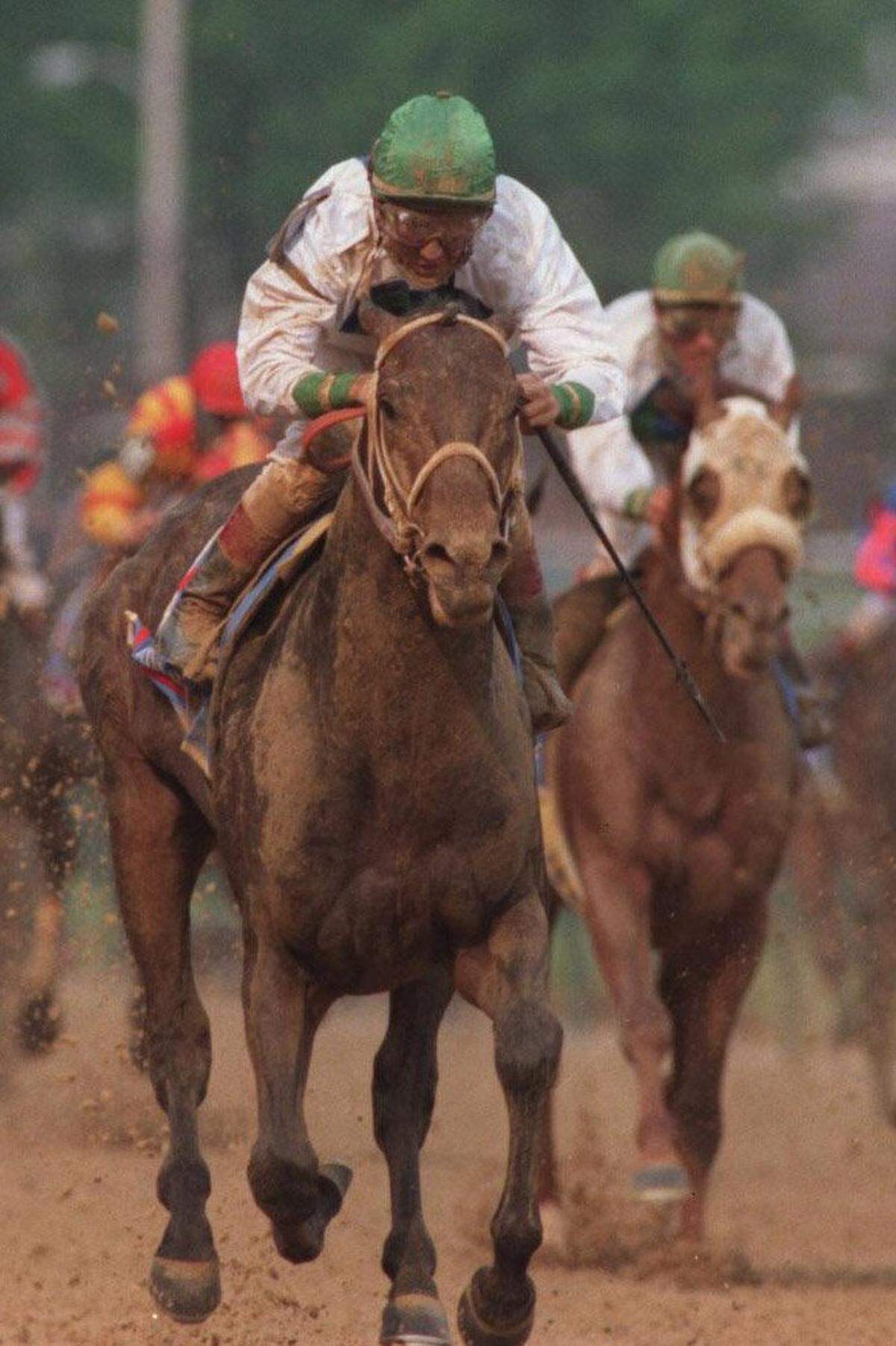 Grindstone, center, came down the stretch to win the 122nd Kentucky Derby at Churchill Downs on May 4, 1996. Grindstone closed with a rush under jockey Jerry Bailey to defeat Cavonnier by a nose in  a photo finish.