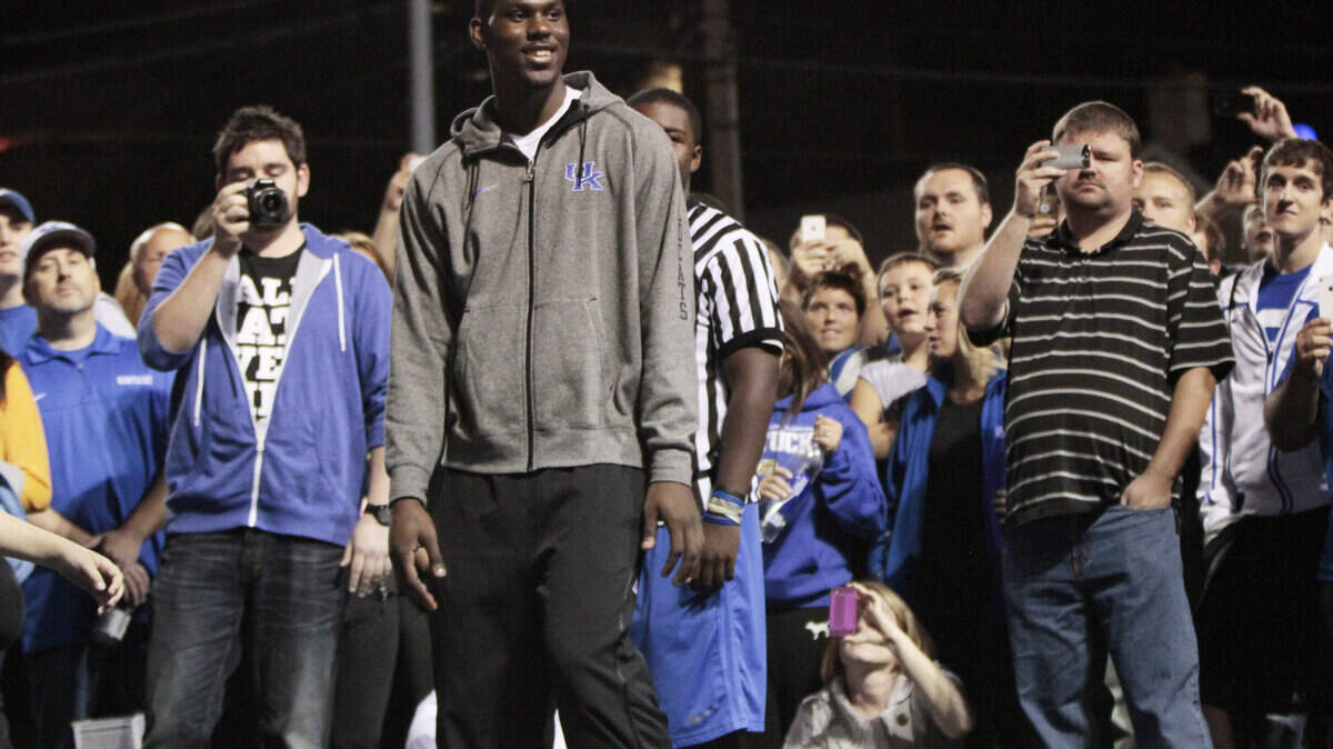Alex Poythress, center, and Nerlens Noel entertained Big Blue Madness campers on a student court near Memorial Coliseum on Sept. 20. Poythress outlined his plan for success at Kentucky: "Work hard, play hard, and everything else will take care of itself."    