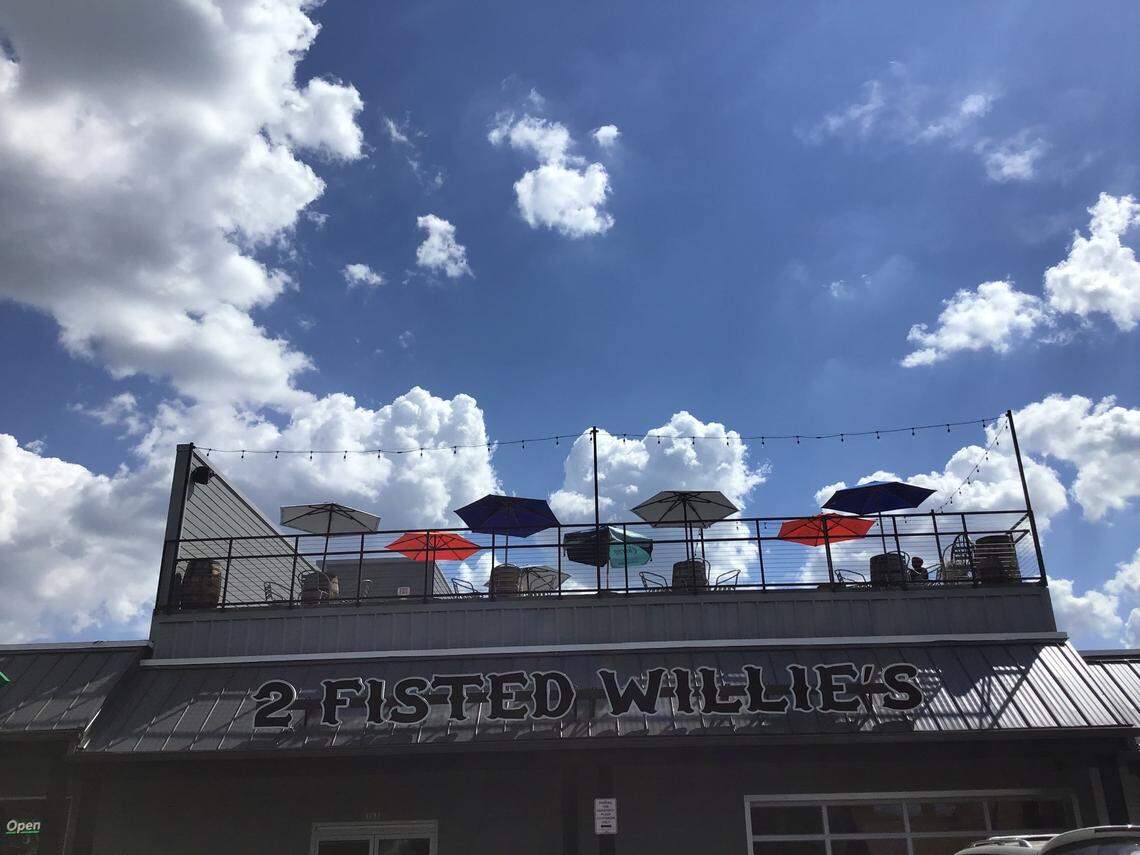 2 Fisted Willie’s, a country bar with a rooftop patio, opened at 388 Woodland Ave. in University Plaza on Sept. 19, 2024. It’s located in University Plaza and over the years has been the Library Lounge, Lynagh’s Music Club and Cosmic Charlie’s.