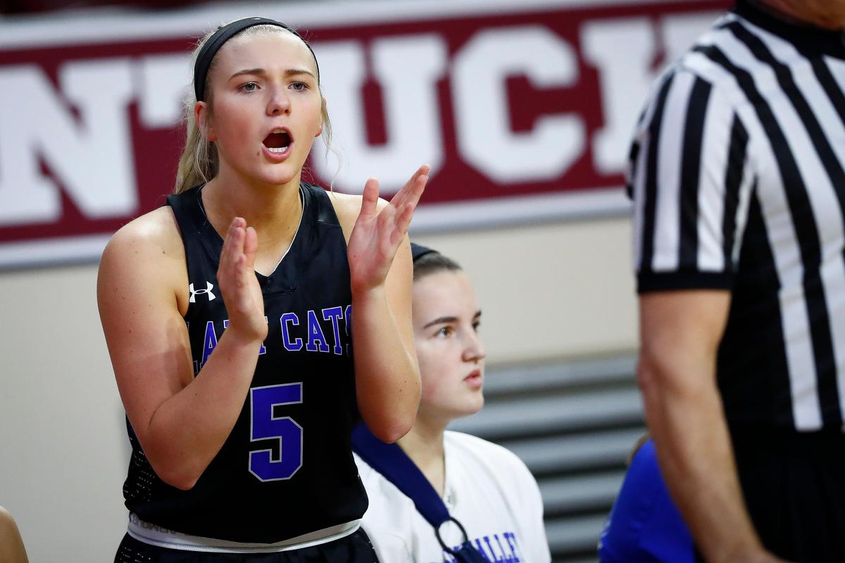 Shelby Valley’s Cassidy Rowe (5) cheered her teammates Wednesday night. Rowe has been easing her way back into the lineup since her most recent surgery last June.