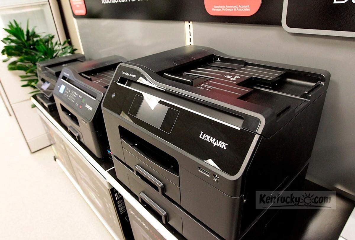 Display models of the most recent Lexmark inkjet printers at Lexmark in Lexington, Ky., on Aug. 28, 2012. Lexmark laid off 1700 workers world-wide, 550 in Lexington Tuesday, ending it’s line of inkjet printers. Photo by Pablo Alcala | Staff
