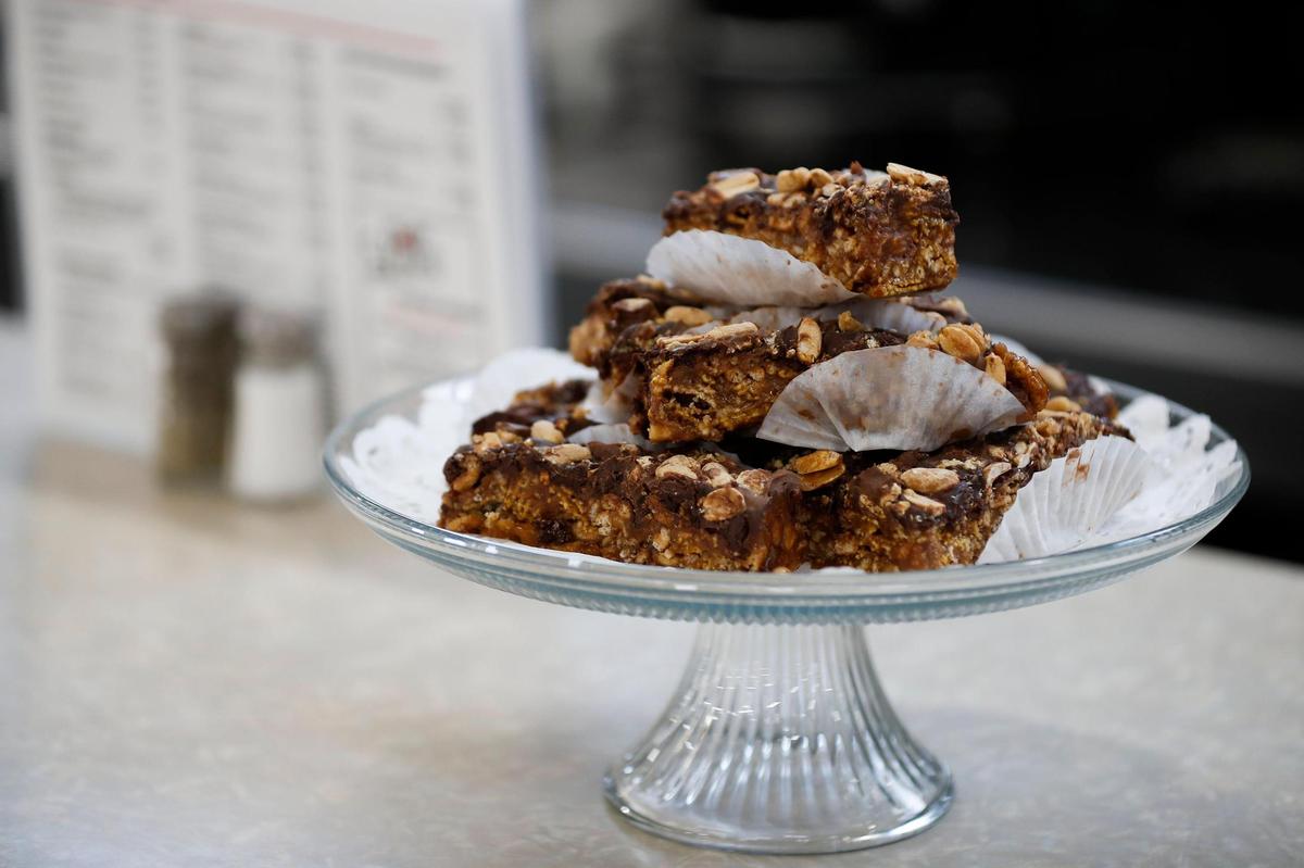 Homemade peanut butter bourbon bars made with peanut butter, chocolate, nuts, honey and four different types of cereal at Lil’s Coffee House in Paris.