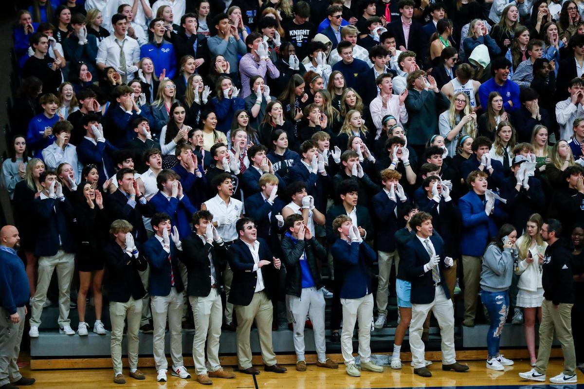 The Lexington Catholic student section helped boost the home-standing Knights to the 43rd District Tournament title on Friday night.