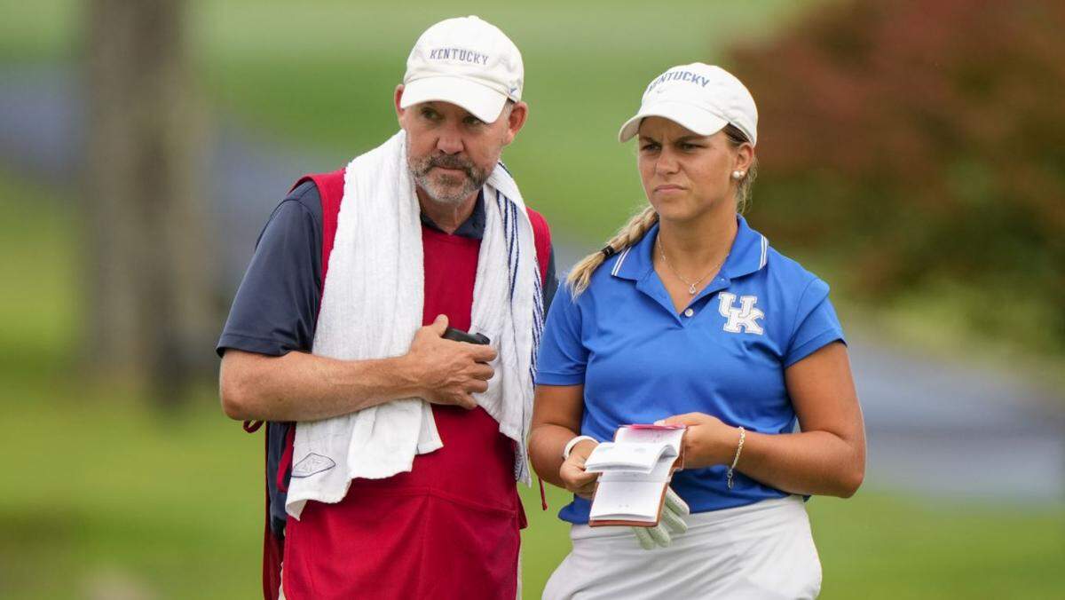Jensen Castle and her caddie, Tom Moylan, discussed strategy Sunday during the championship match of the U.S. Women’s Amateur. Castle became the first University of Kentucky golfer to win the event.