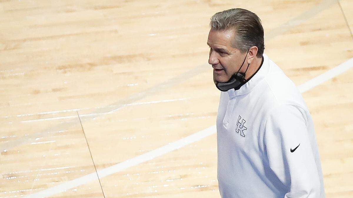 John Calipari picked up a technical foul in the first half, but he was all smiles after Kentucky rallied back in the second half to beat Auburn, 82-80, at Rupp Arena on Feb. 13.