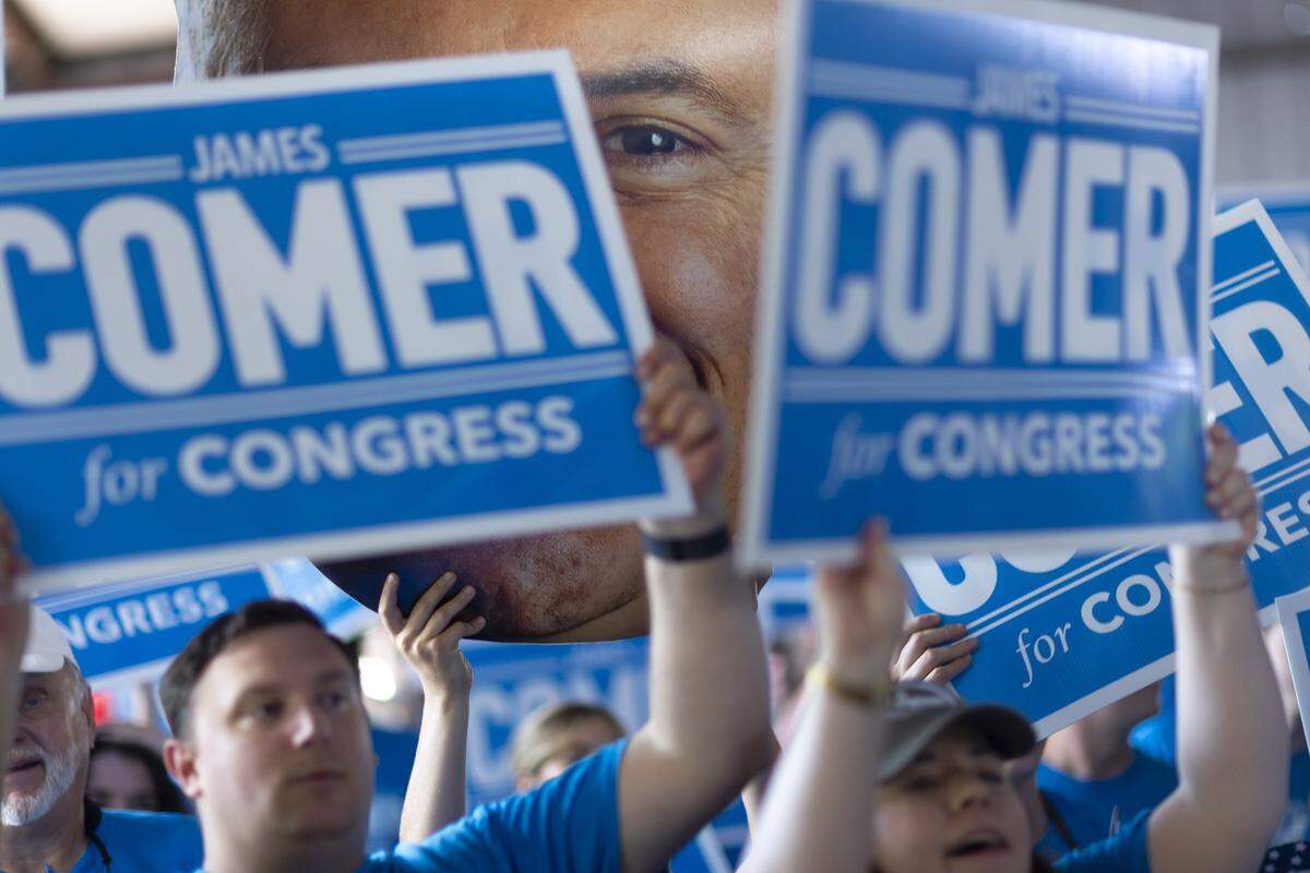 James Comer supporters cheer during the political speaking at the 145th Annual St. Jerome Fancy Farm Picnic in Fancy Farm, Ky., on Saturday, Aug. 2, 2025.