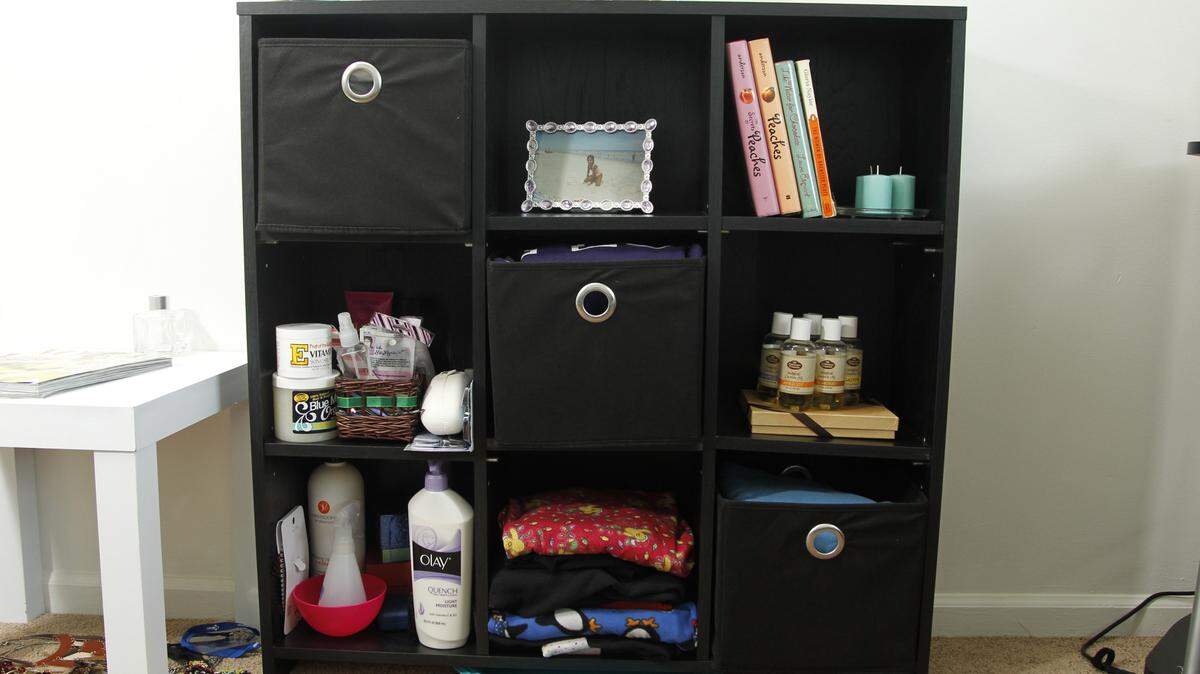 Instead of a dresser, consider a cube storage system; open spaces might be easier to keep neat. 