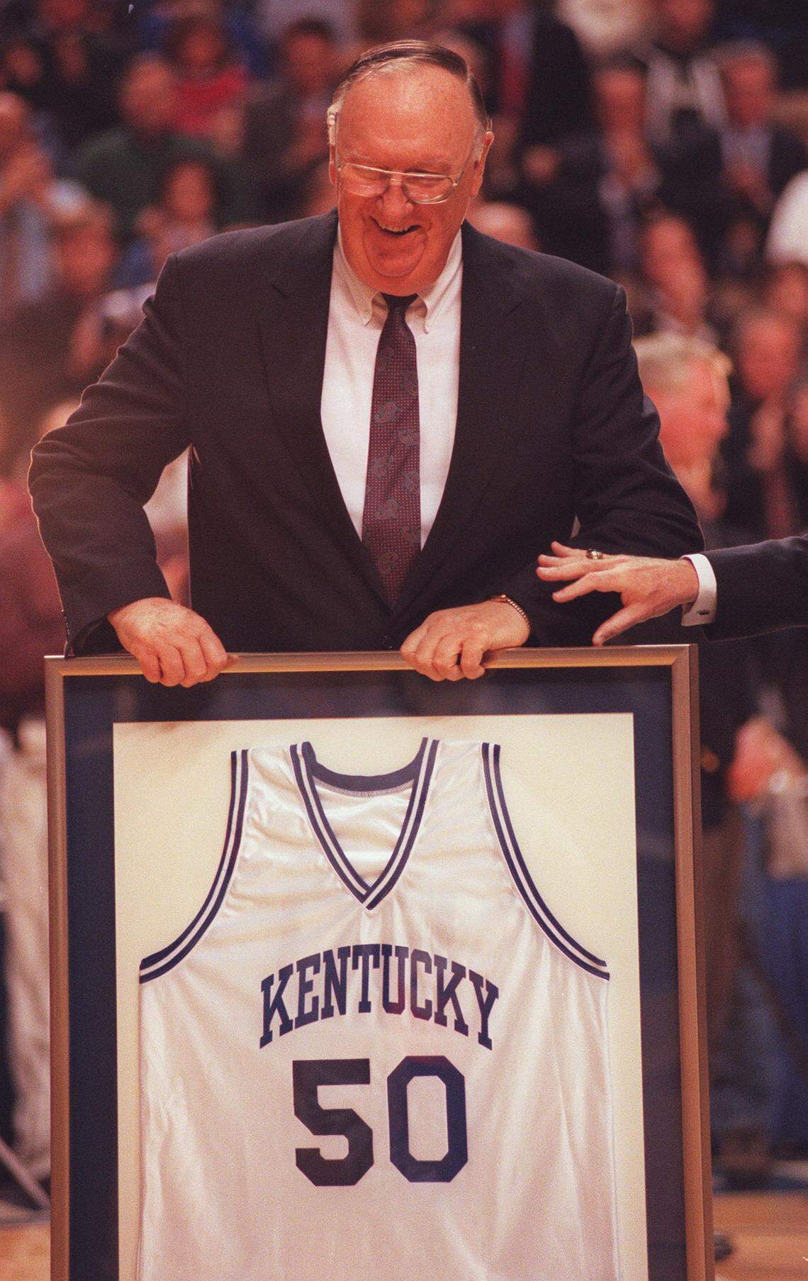Kentucky great Bob Burrow smiled as he had his jersey retired to the rafters of Rupp Arena before UK’s game against South Carolina on Feb. 13, 1999.