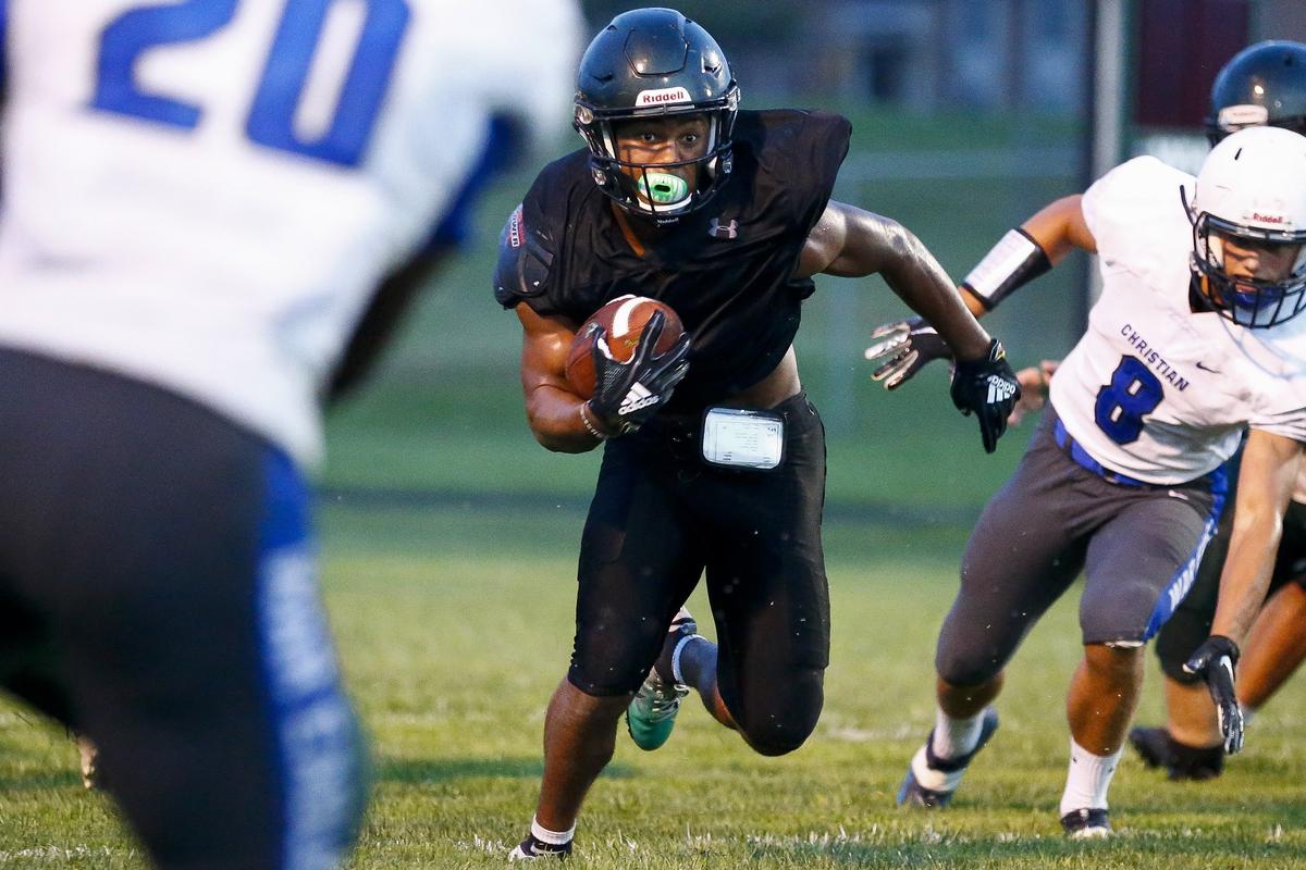 Wandale Robinson, pictured here during a preseason scrimmage, totaled 294 yards and five TDs in Western Hills’ victory Friday night.