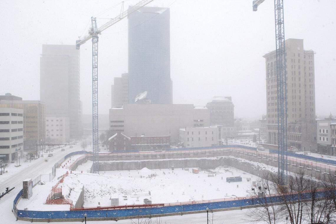 Downtown skyline as heavy snow falls during a winter storm in Lexington, Ky., Monday, February 16, 2015. Photo by Matt Goins