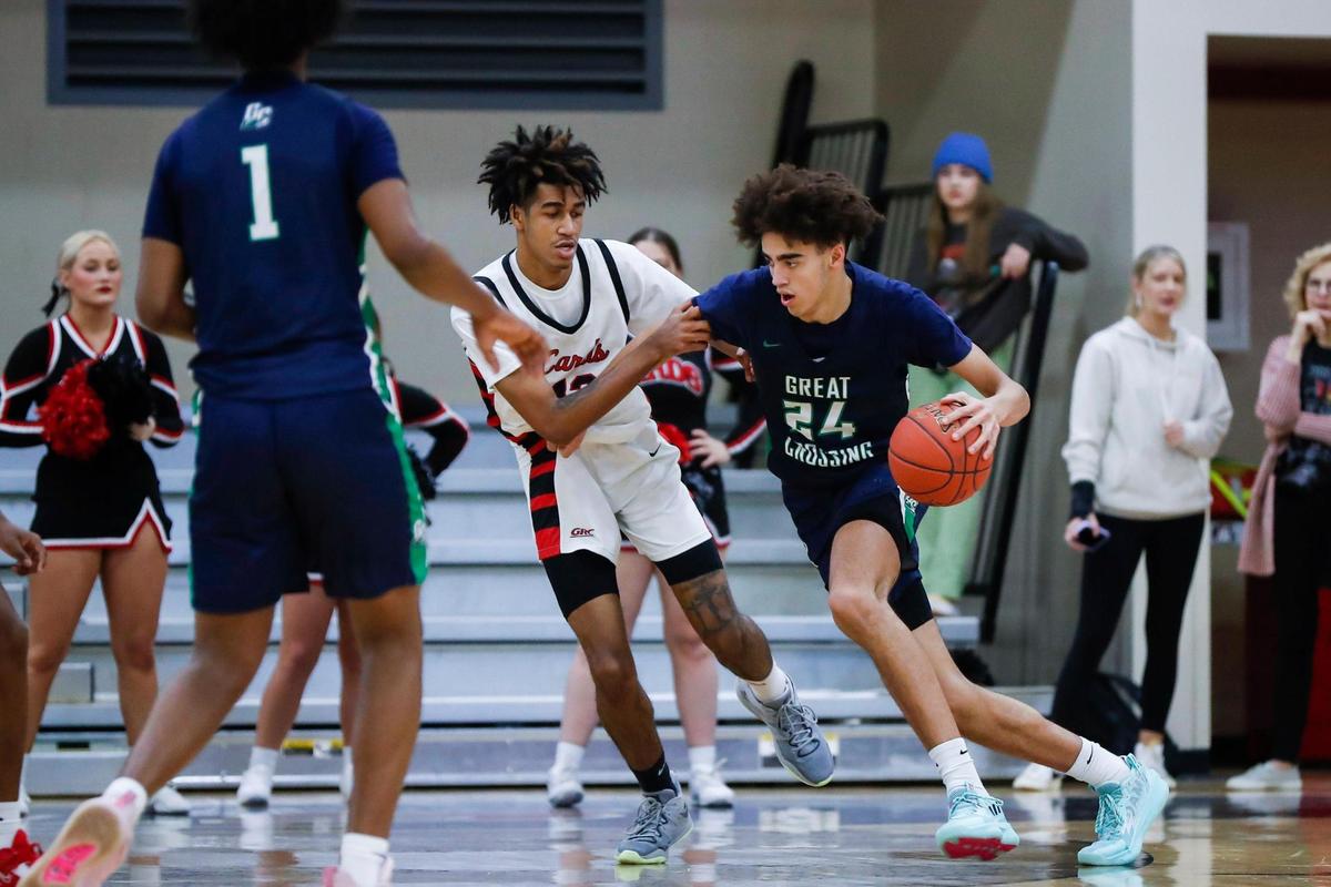 Great Crossing center Malachi Moreno (24) drives to the basket against George Rogers Clark’s Trent Edwards (13) during their game at George Rogers Clark last week.