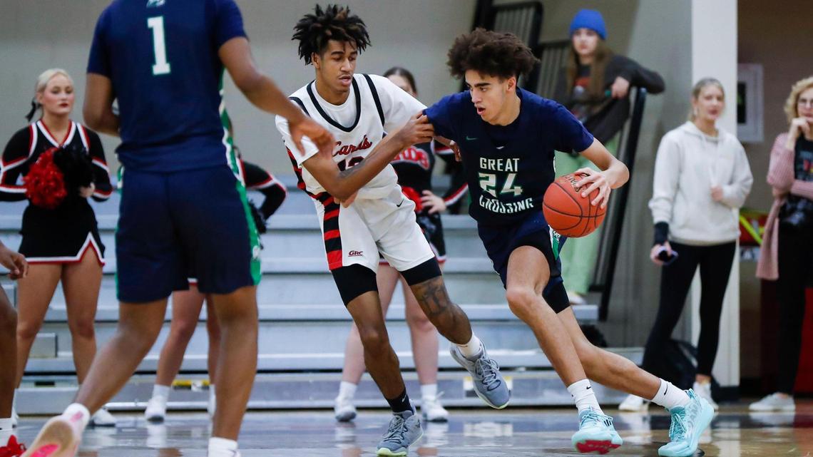 Great Crossing center Malachi Moreno (24) drove to the basket against George Rogers Clark’s Trent Edwards (13) during their game at George Rogers Clark High School in Winchester on Jan. 5.