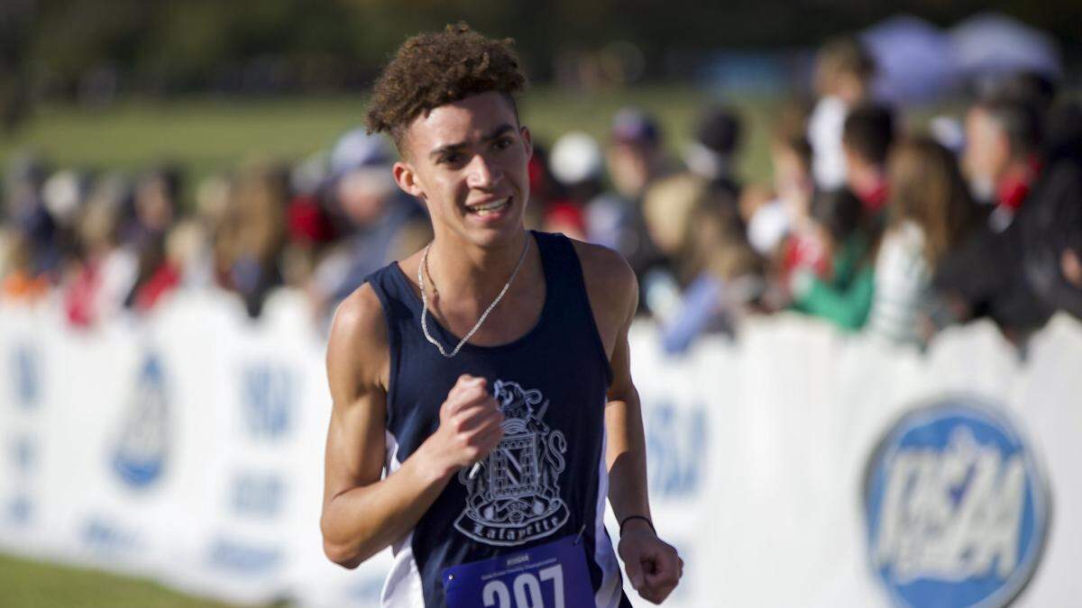 Lafayette's Xavier Richardson nears the finish line during the 2025 KHSAA Class 3A State Cross Country Meet at the Kentucky Horse Park in Lexington, Ky., on Saturday, Nov. 1, 2025. Richardson won second place. 