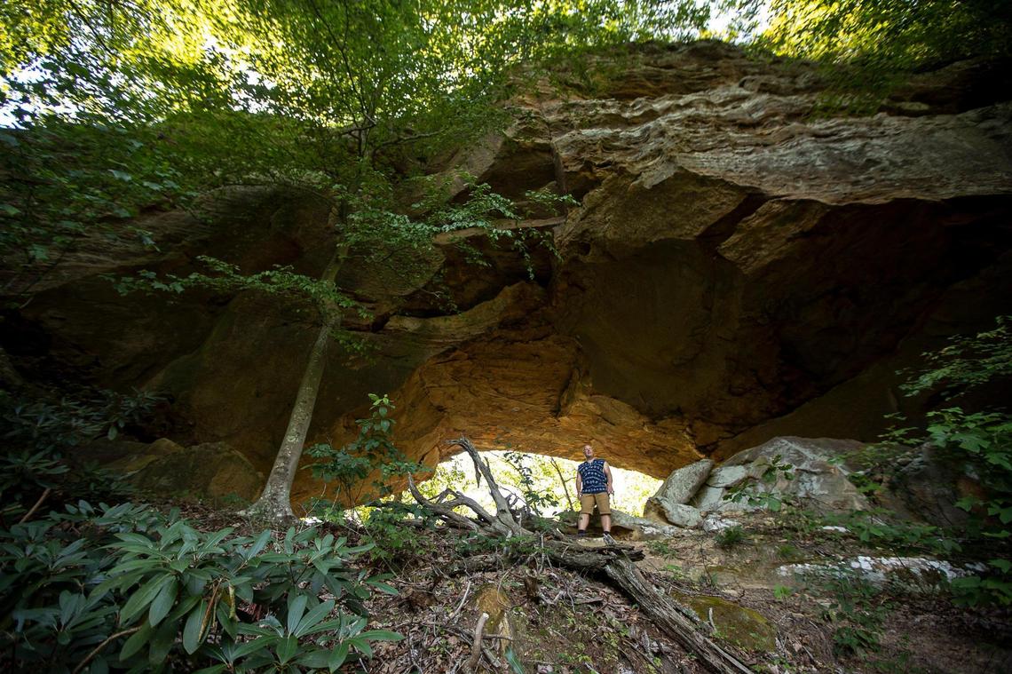 Ian Teal poses for a portrait near Adventure Arch, located on property he owns near the Slade exit off the Mountain Parkway, close to the Natural Bridge State Park, in Powell County, Ky., on Friday, Aug. 7, 2020. The Red River Economic Development LLC has an option on Teal’s property to develop a “destination resort.”