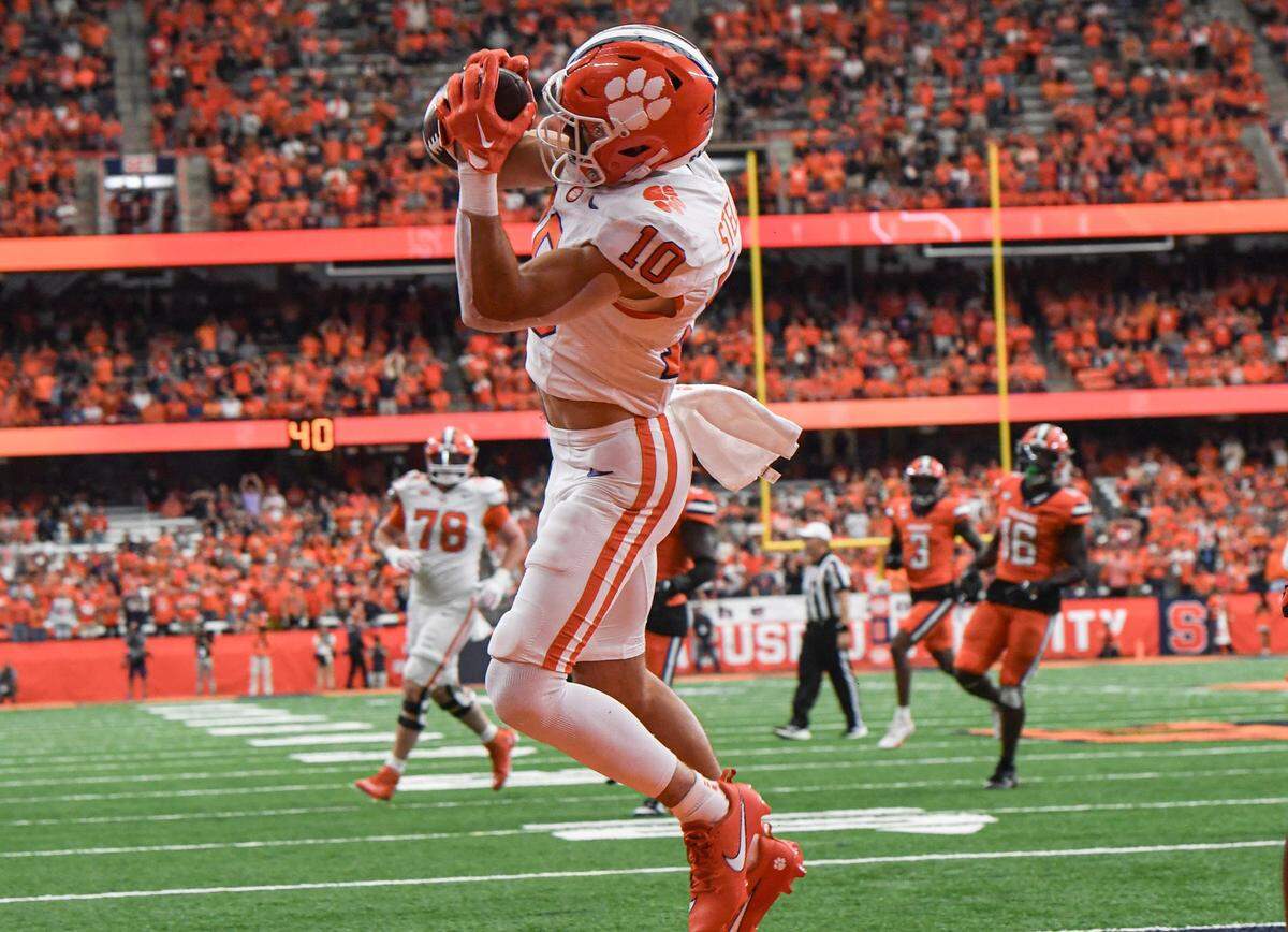 Clemson wide receiver Troy Stellato (10) catches a pass for a touchdown during the first quarter Sep 30, 2023; Syracuse, New York, USA; at JMA Wireless Dome.