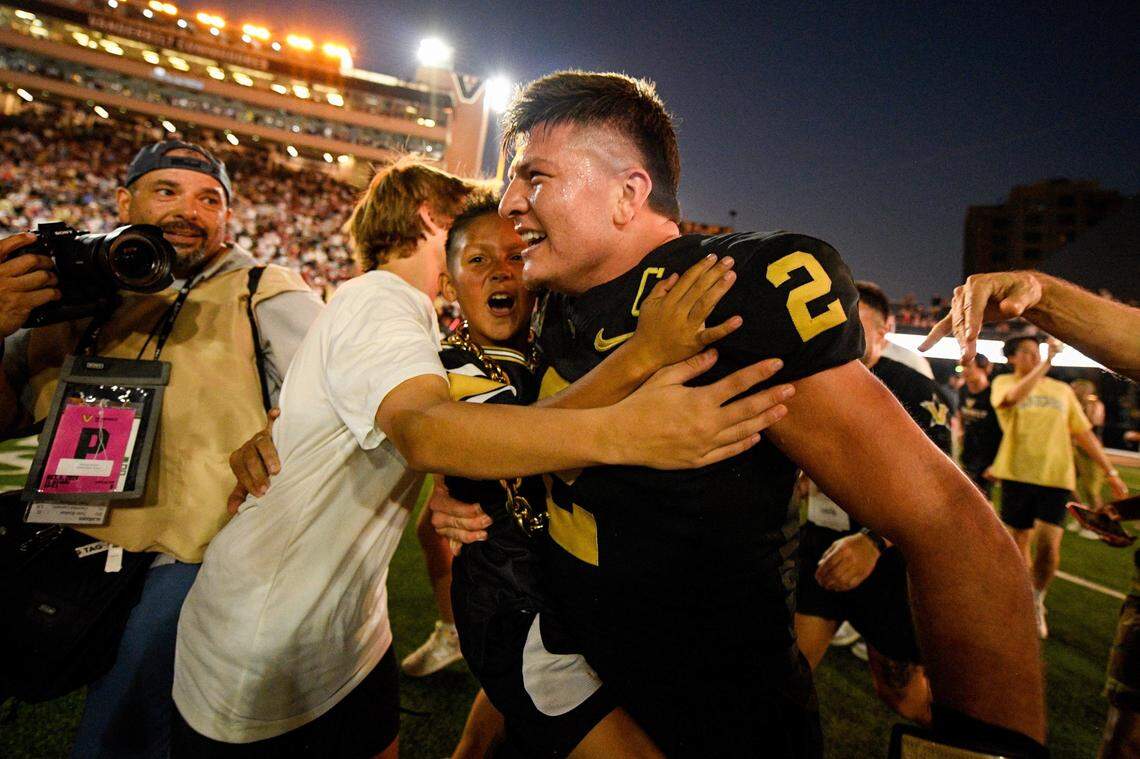 Oct 5, 2024; Nashville, Tennessee, USA;  Vanderbilt Commodores quarterback Diego Pavia (2) celebrates the upset win over Alabama Crimson Tide during the second half at FirstBank Stadium. Mandatory Credit: Steve Roberts-Imagn Images