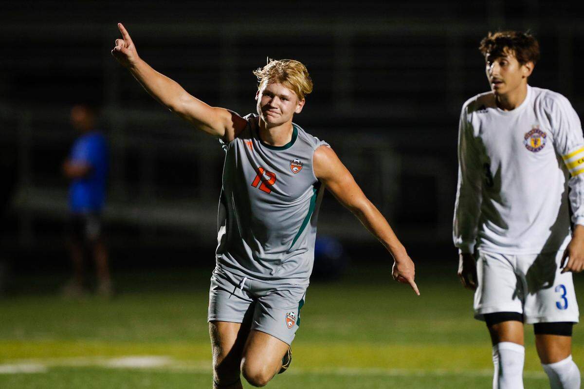Cooper Ranvier celebrates after scoring one of his two second-half goals Tuesday night as Frederick Douglass defeated Henry Clay 4-1.