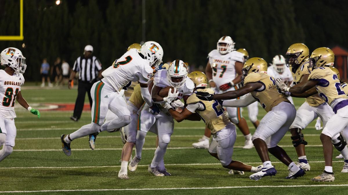 Frederick Douglass used a dominant running game to carry themselves to a 35-13 Rafferty’s Bowl win over defending Class 5A champion Bowling Green. Kenoxie “TayTay” Allen (22) ran for 42 yards and a TD.
