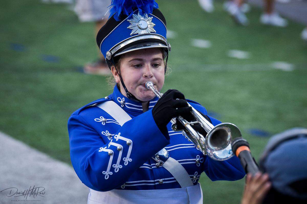 Tess Wampler, a member of the Wildcat Marching Band, performs “Call to the Post” prior to a Kentucky football home game this season at Kroger Field. Wampler is a trumpet performance major at UK and is in her first year with the marching band.