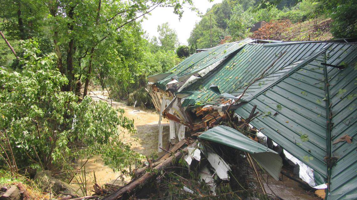 Flash flooding in Perry County, Ky., on July 28, 2022 washed a mobile home owned by Eunice Howard more than 100 yards down Grapevine Creek and smashed it against a bridge.
