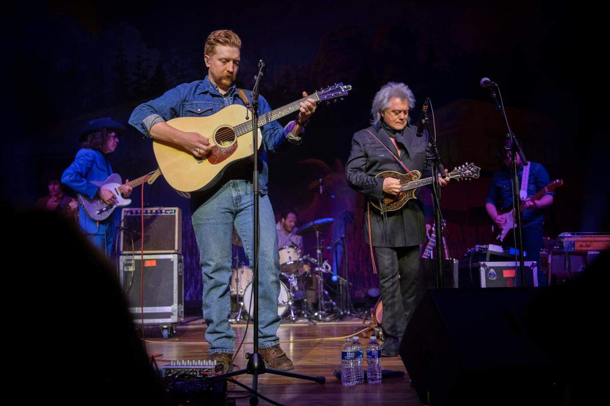 Marty Stuart, center, joined Lawrence County, Ky. native Tyler Childers, left, onstage Friday, Feb. 7, 2020, at the Ryman Auditorium in Nashville, Tenn. Childers is in the middle of a two-weekend residency on the famous stage. Stuart and his band also opened for Childers.